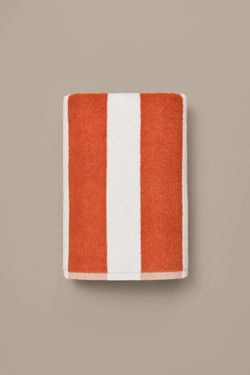 Poolhanddoek Spritz vlak opgehangen, witte en oranje banen